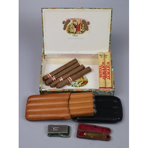 145 - Collection of cigars to include cigar cutter etc