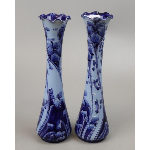 208 - Pair of William Moorcroft Florian Ware vases one with damage - Approx height: 30cm