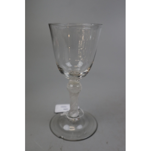 223 - Georgian wine glass with a round funnel bowl on a double knopped opaque twist stem with conical foot