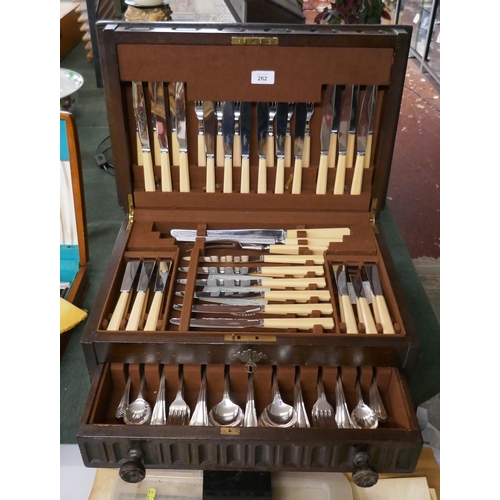 262 - Carved oak canteen of cutlery by Thomas W Cork & Sons, Sheffield