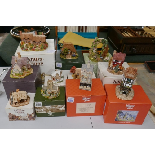 307 - Collection of 9 Lilliput Lane in original boxes together with one without its box