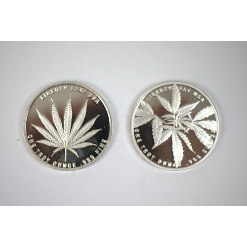 104 - 2 silver 1oz coins