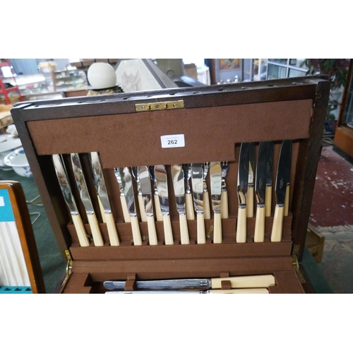 262 - Carved oak canteen of cutlery by Thomas W Cork & Sons, Sheffield