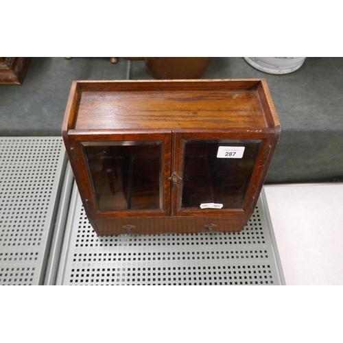 287 - Small glass fronted smokers cabinet