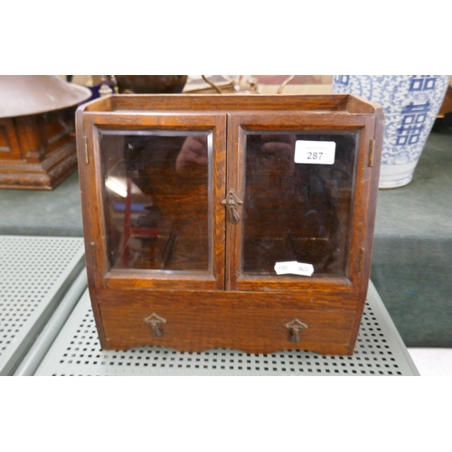 287 - Small glass fronted smokers cabinet