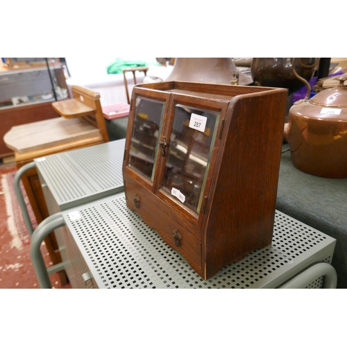 287 - Small glass fronted smokers cabinet