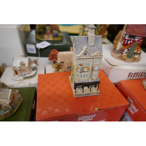 307 - Collection of 9 Lilliput Lane in original boxes together with one without its box