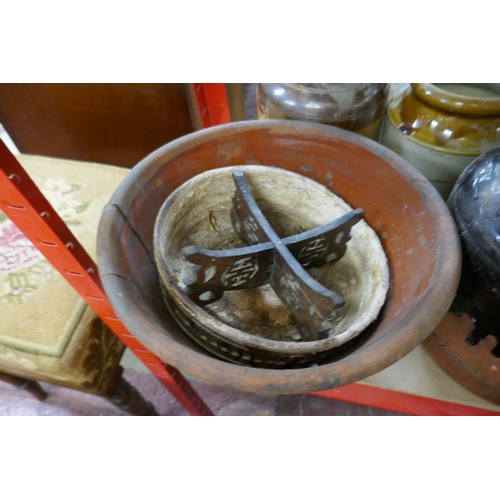 311 - Quantity of 8 earthenware pots together with small stand