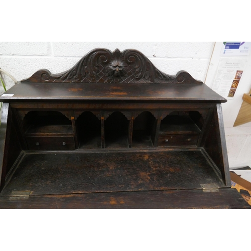 393 - Ebonised oak green man bureau 