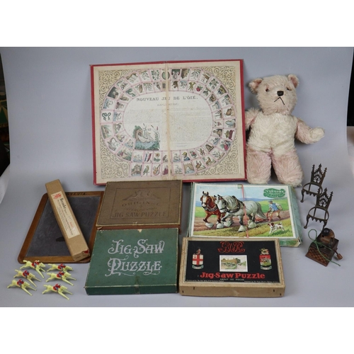 107 - Collection of vintage toys to include jigsaws, teddy, recorder etc