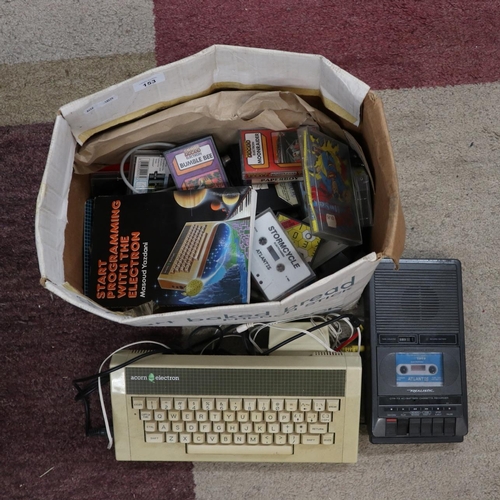 153 - Acorn electron computer together with cassette player and cassette games