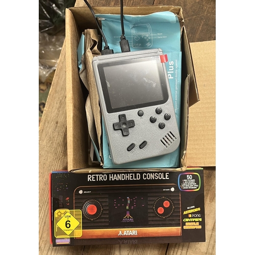 178 - 2 handheld retro consoles to include Atari