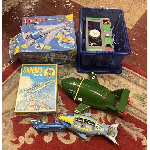 275 - Good collection of Stingray figures and vehicles together with Thunderbird 1 and 2 vehicles