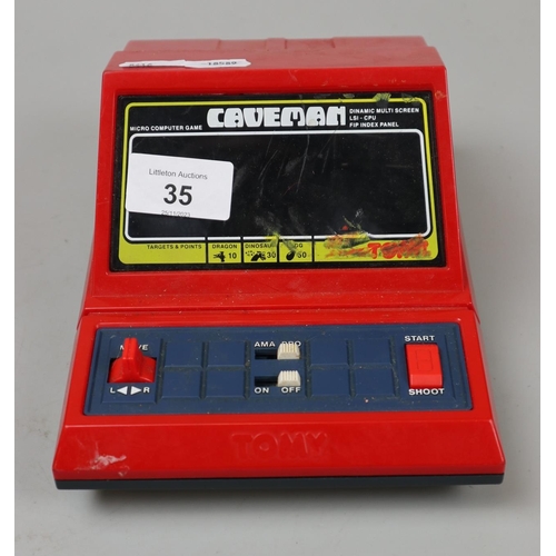 35 - Tomy Caveman micro computer game