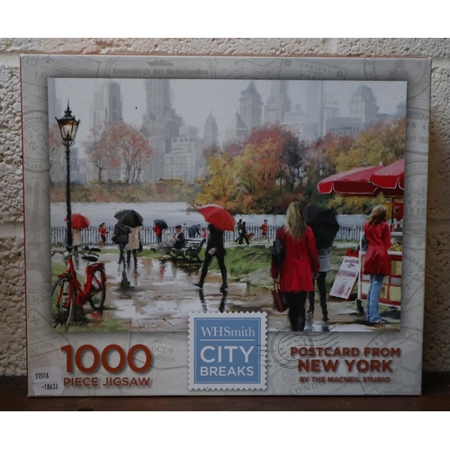 354 - 4 1000 piece jigsaws to include Disney Little Mermaid, Postcard from New York and world landmarks by... 