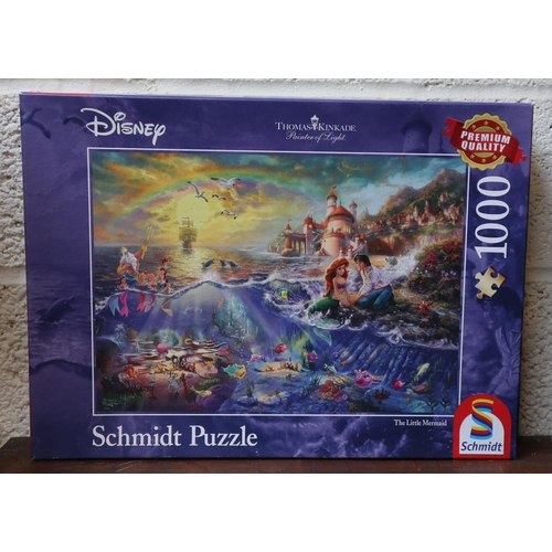 354 - 4 1000 piece jigsaws to include Disney Little Mermaid, Postcard from New York and world landmarks by... 