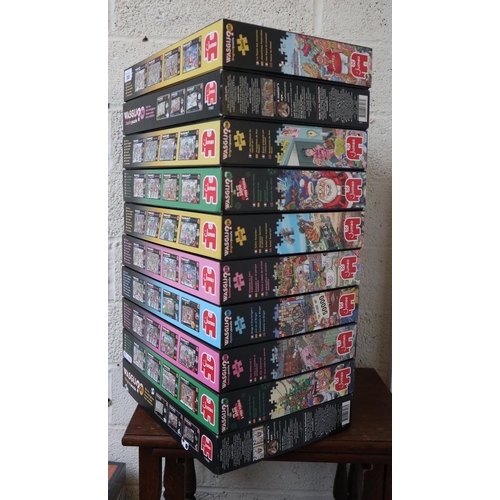 355 - 10 boxed WASGIJ (jigsaw puzzles). Some Christmas & New Year