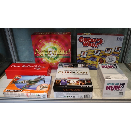 58 - Collection board games to include Cards against Disney together with an Airfix quick build Spitfire