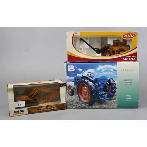 93 - 2 boxed diecast construction vehicles together with tractor