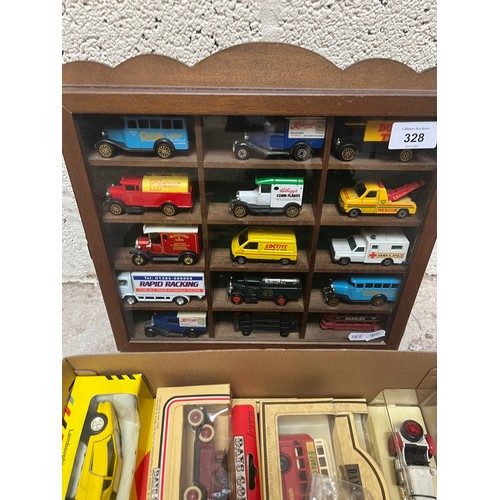 328 - Diecast model cars in display case together with boxed diecast model cars