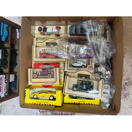 328 - Diecast model cars in display case together with boxed diecast model cars