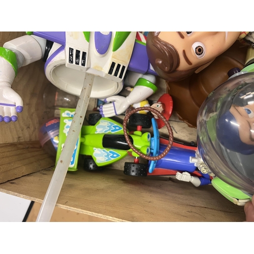 183 - Collection of Toy Story to include a large Woody and Buzz Lightyear