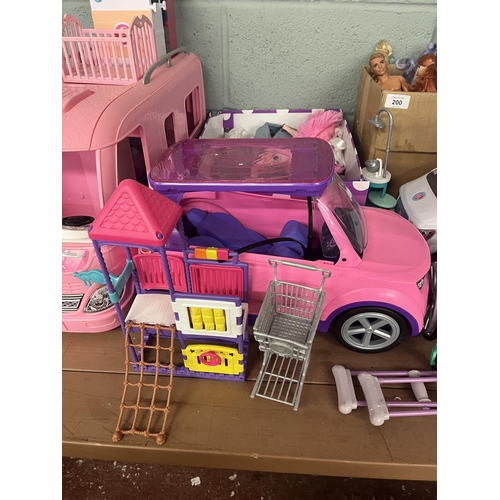 200 - Large collection of Barbie toys to include Barbie camper, dolls & clothing 