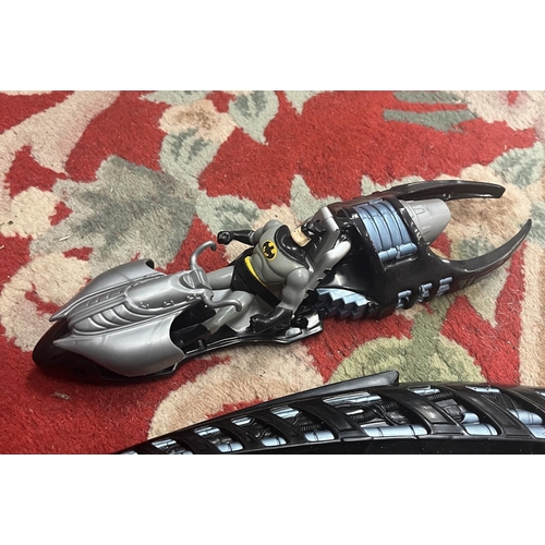 274 - Batwing vehicle together with Batman action figure