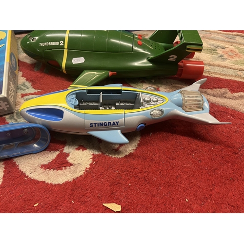 275 - Good collection of Stingray figures and vehicles together with Thunderbird 1 and 2 vehicles