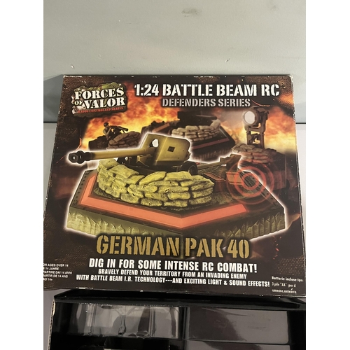 300 - Forces of Valor Battle Beam RC defender series, German Pak 40, together with figures and accessories... 