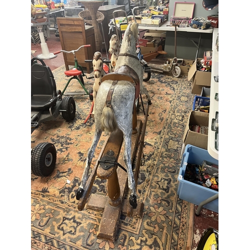 312 - Edwardian period rocking horse by G & J lines Circa 1L: 130cm  H to ear: 107cm  H to saddle seat... 