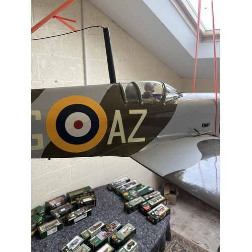 348 - De-Agostini R.C. Spitfire 1:10 scale including transmitter together with the original magazines in b... 