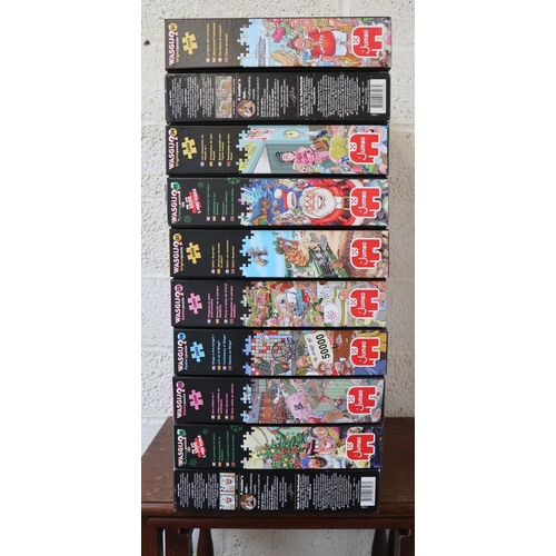 355 - 10 boxed WASGIJ (jigsaw puzzles). Some Christmas & New Year