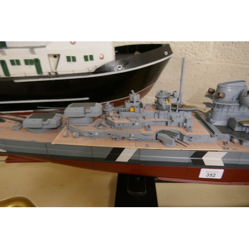 352 - Radio control operated model of the German Battleship Bismark with many servers. Box of spare parts ... 