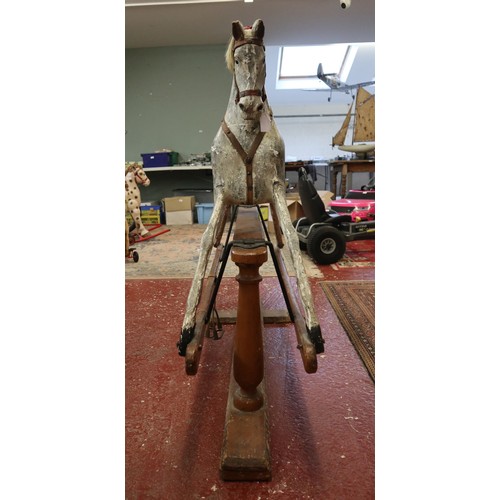 312 - Edwardian period rocking horse by G & J lines Circa 1L: 130cm  H to ear: 107cm  H to saddle seat... 