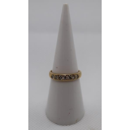 264 - 18ct gold 7 stone diamond ring - Size L½