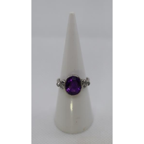 265 - 18ct white gold amethyst and diamond ring - Size L