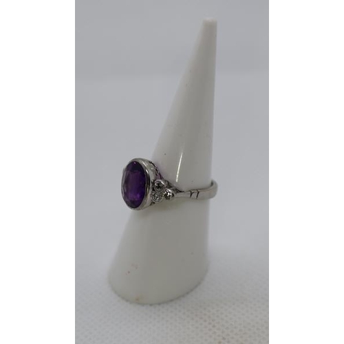 265 - 18ct white gold amethyst and diamond ring - Size L