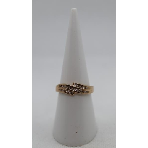 107 - 9ct gold channel set diamond ring - Size M½