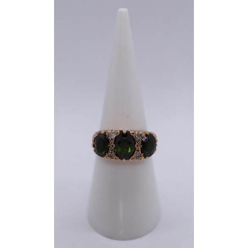 240 - 9ct gold green garnet and diamond set ring - Size L