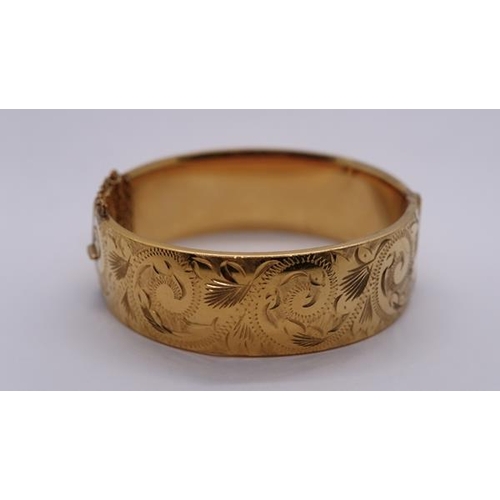 256 - Rolled gold bangle