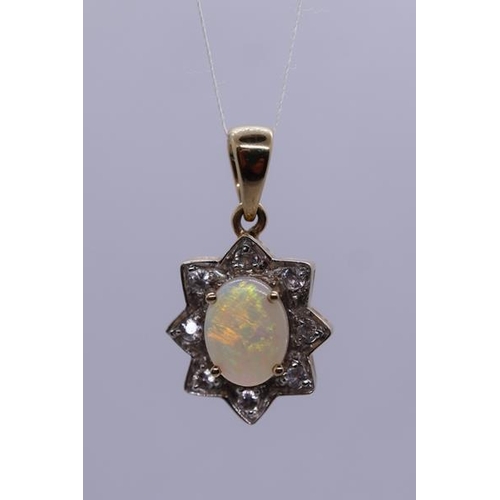 67 - 9ct gold opal and diamond pendant