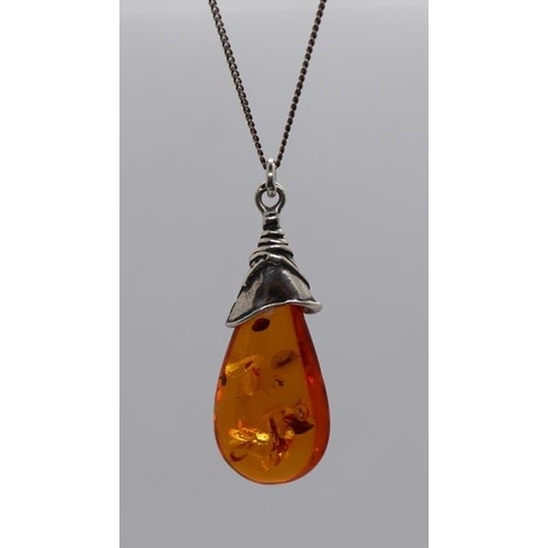 17 - Amber pendant and earrings