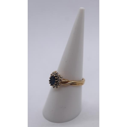49 - 9ct gold diamond and sapphire cluster ring - Size M½