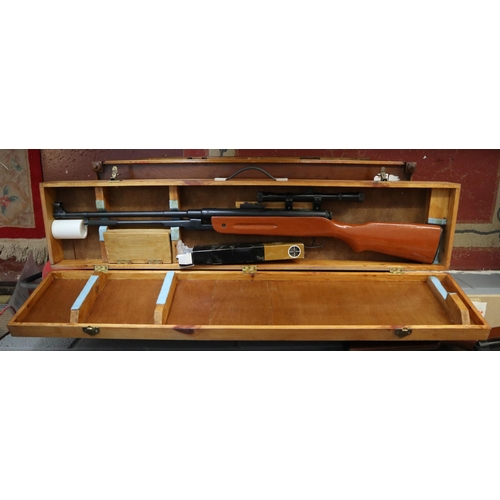 139 - .22 underlever air rifle with scope in wooden case