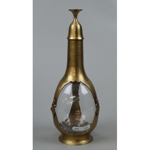 167 - Interesting brass and glass decanter with cup acting as lid