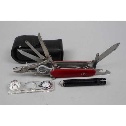 185 - Swiss army knife in pouch with accessories to include compass magnifying glass and torch etc