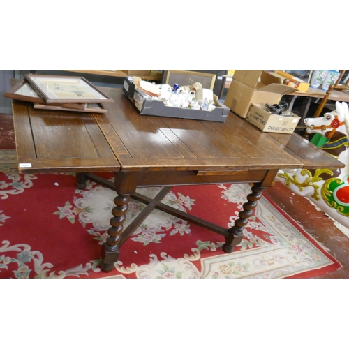 347 - Oak draw leaf table on barley twist legsL: 183cm when open 106cm when closed approxW: 99cm approxH: ... 