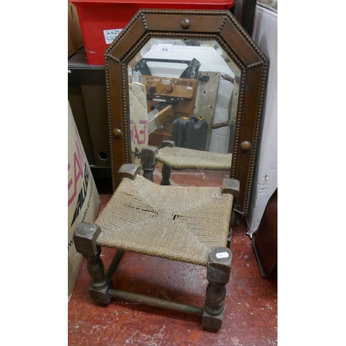 416 - Oak framed bevelled glass mirror together with rush seated foot stool