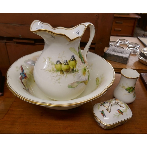 476 - Jug and bowl set together with soap dish and toothbrush holder (early repair to jug)